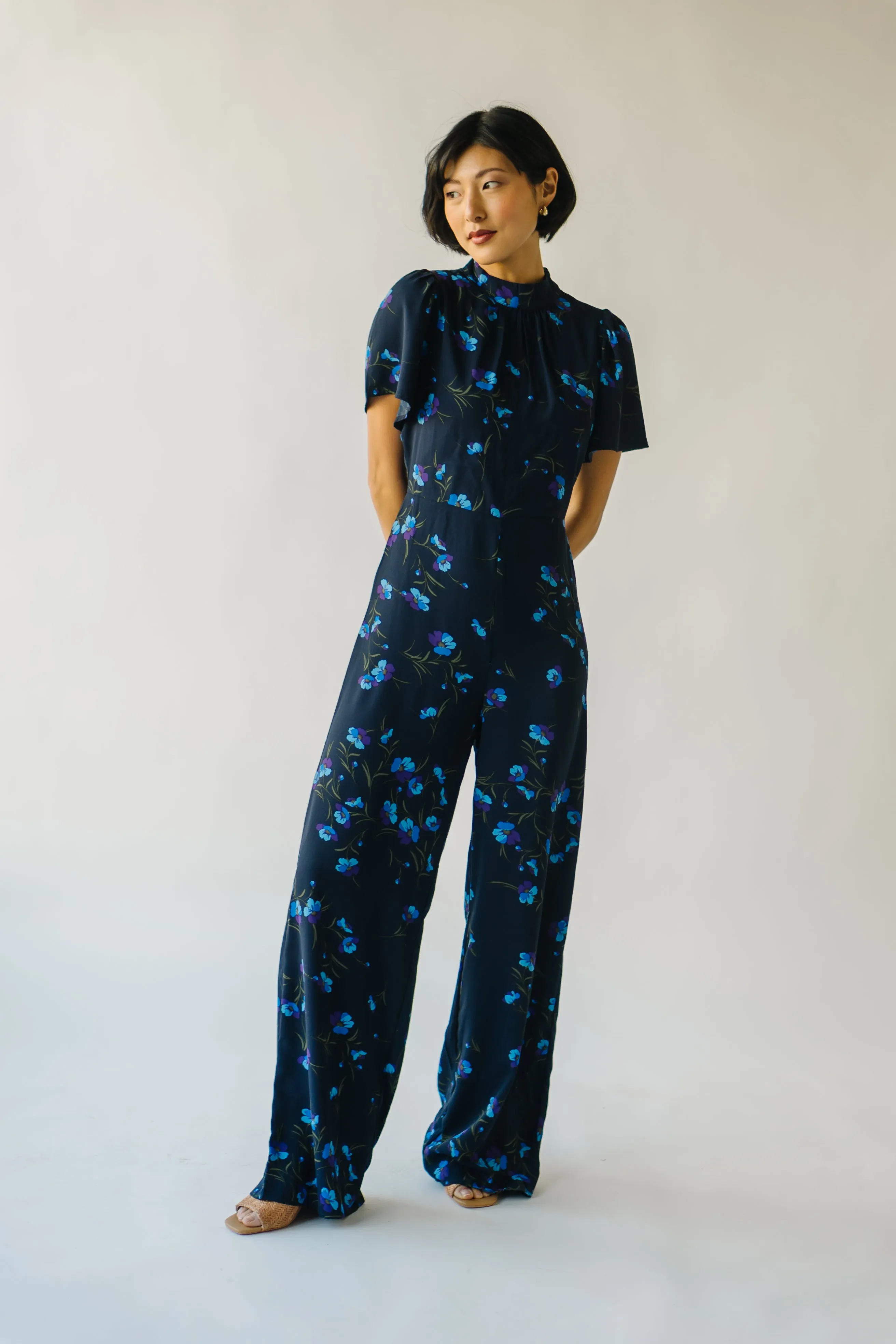 The Seldovia Mock Neck Jumpsuit in Navy + Purple